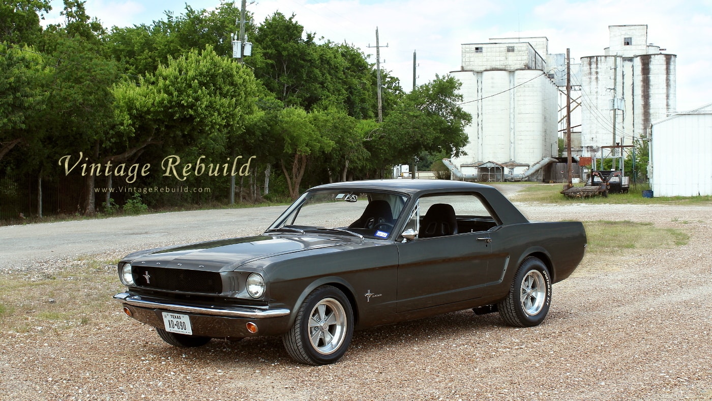 Gray 1965 Ford Mustang Coupe race car. 1965 Mustang V8 Glory. This rough 1965 mustang is ready to race.